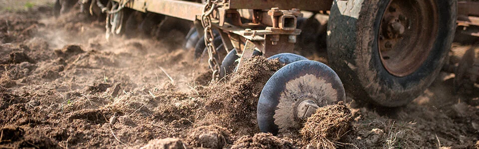 plough the soil